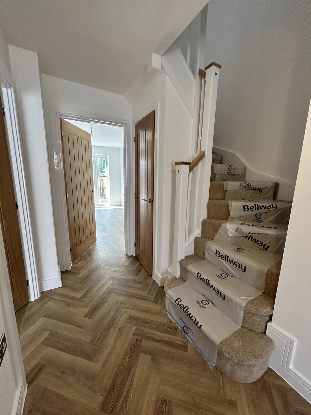 Bellway Lymm new build finished hall and staircase