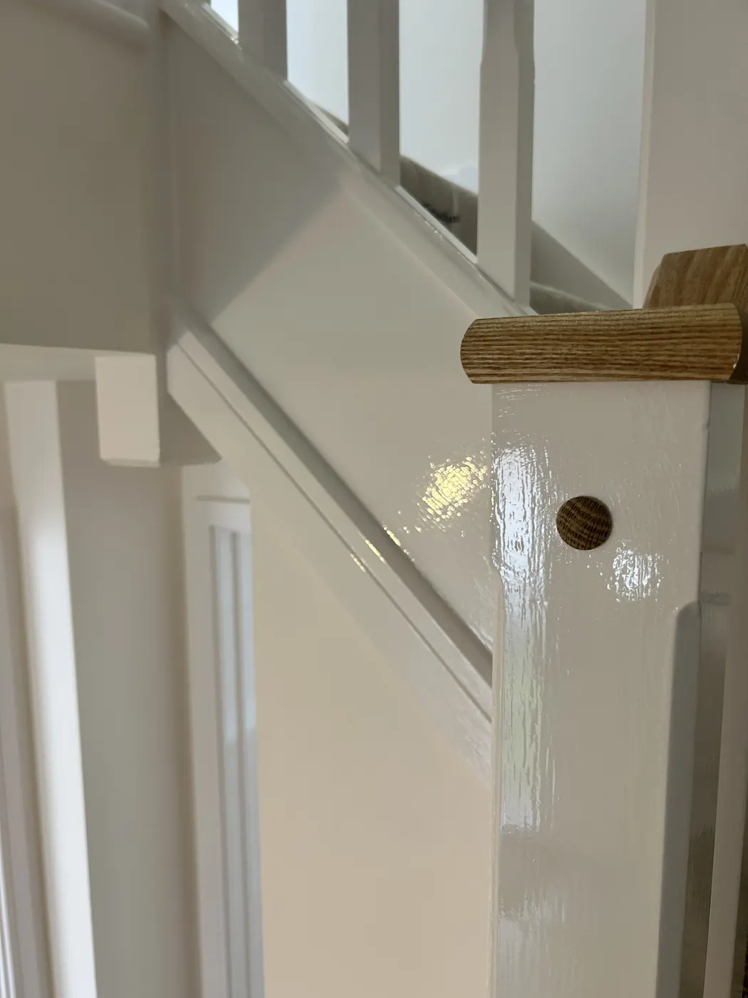 Finished gloss stair detail in a completed residential interior